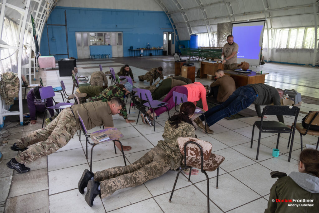 Ukraine War / Donbas Frontliner /  Right Sector battalion of Hospitallers cadets hold plank during the "Sobol" lesson