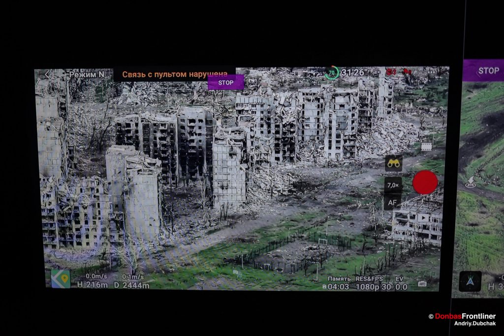 Donbas Frontliner, Ukraine war, artillery grad Partizan, Aidar battalion,  Bakhmut from drone. In the drone images, Bakhmut looks poignant. The city is completely destroyed. The once lively neighborhoods have turned into scorched earth.