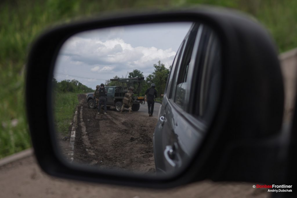 Donbas Frontliner, Ukraine war, artillery grad Partizan, Aidar battalion, soldiers ready to drive from the fire position, Andriy Dubchak