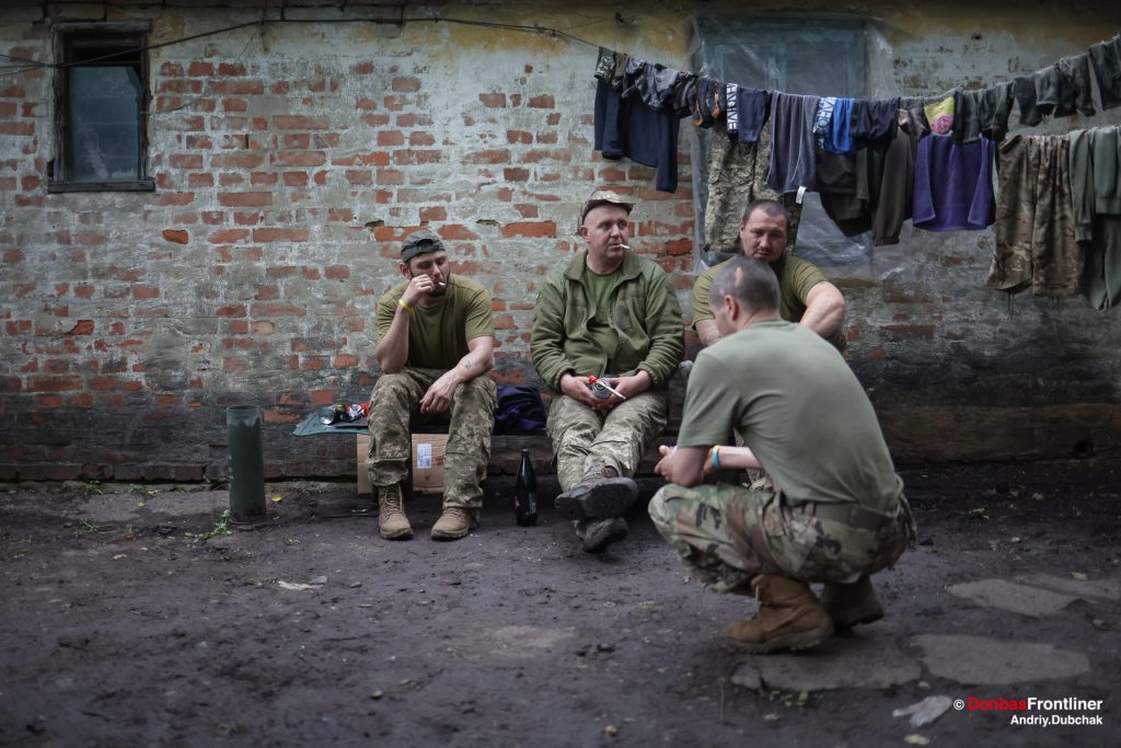 Donbas Frontliner, Ukraine war, artillery grad Partizan, Aidar battalion,  soldiers rest and smoke, Andriy Dubchak